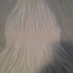 White sleeveless top